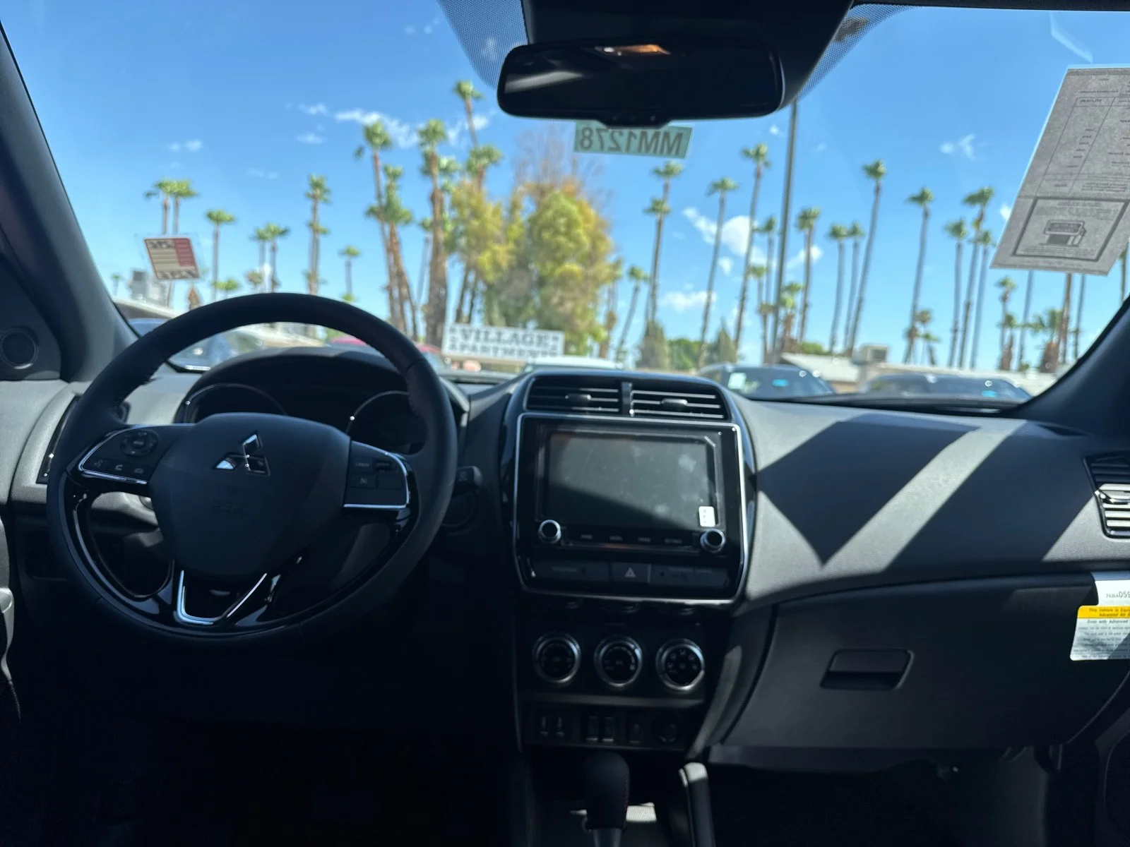 Used 2025 White Diamond Mitsubishi Trail Edition image 29