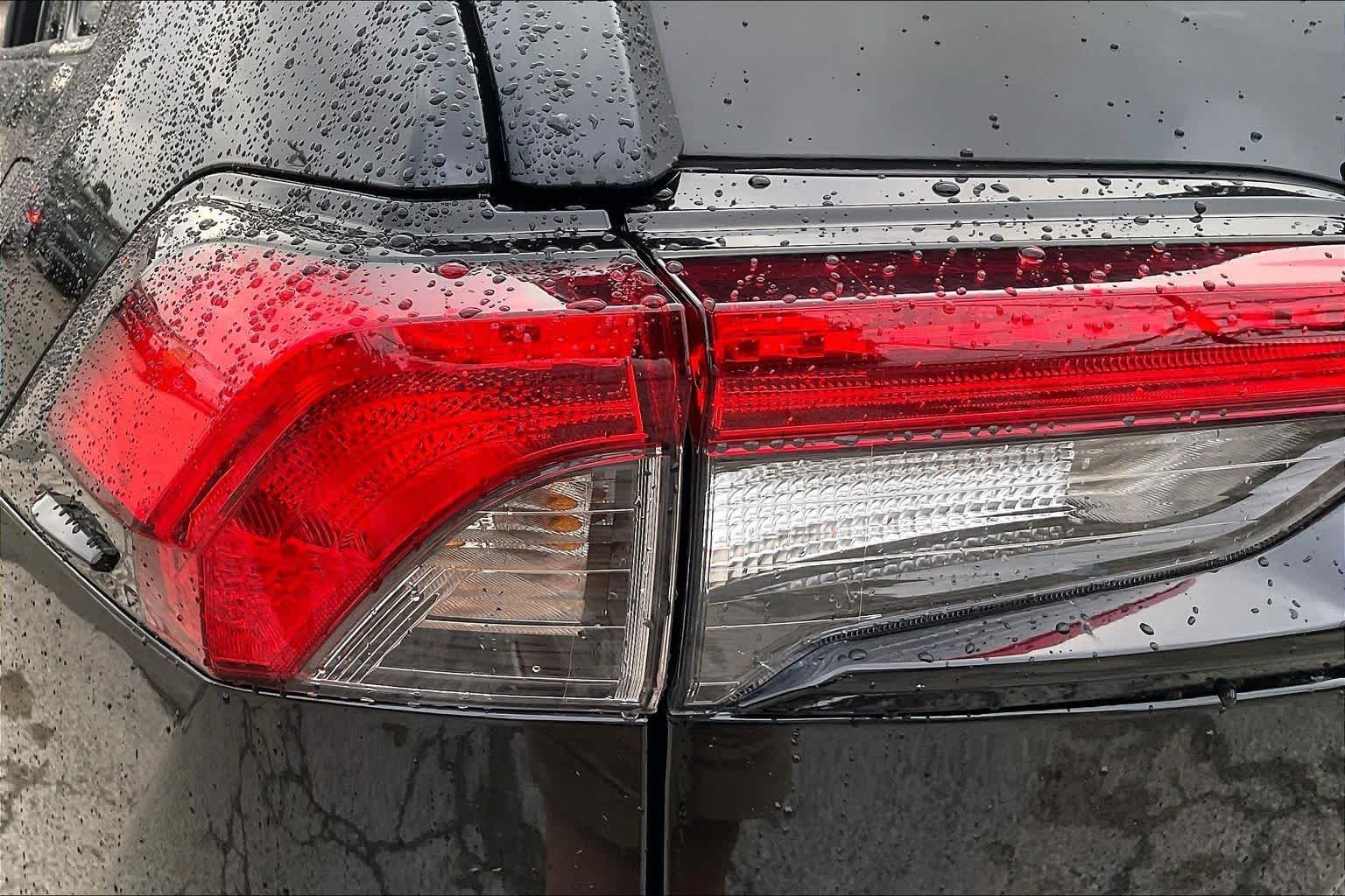 Used 2025 Midnight Black Metallic Toyota LE image 28