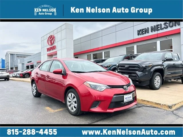 Used 2016 Barcelona Red Metallic Toyota LE image 1