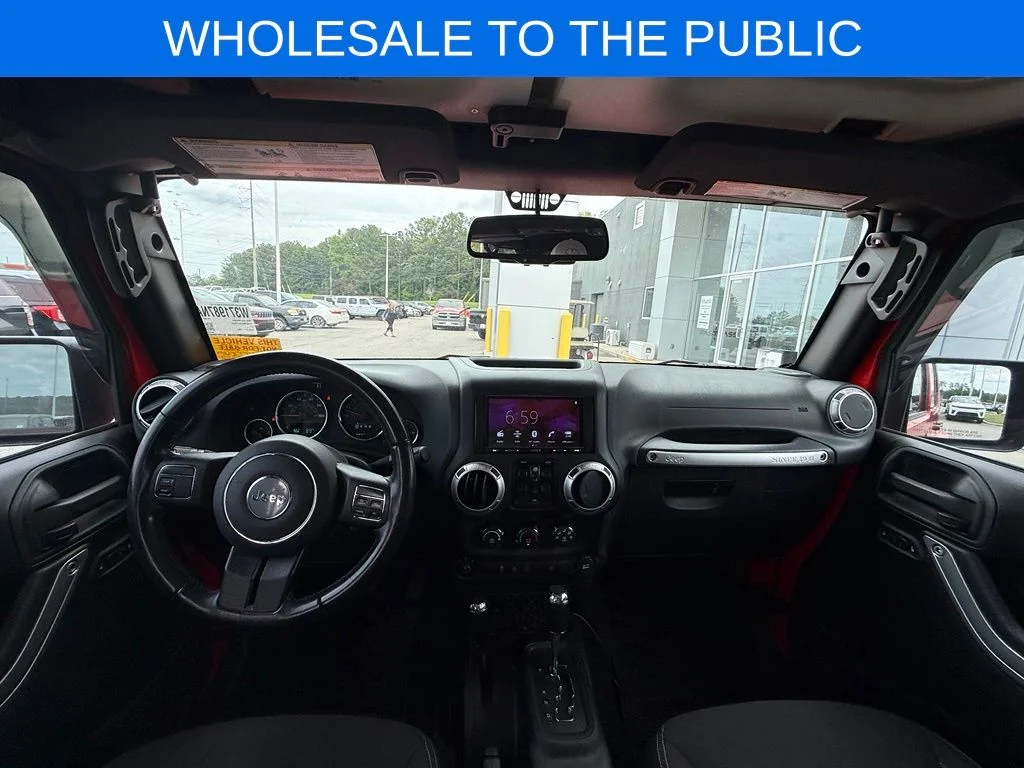 Used 2016 Red Jeep Unlimited Sahara image 7