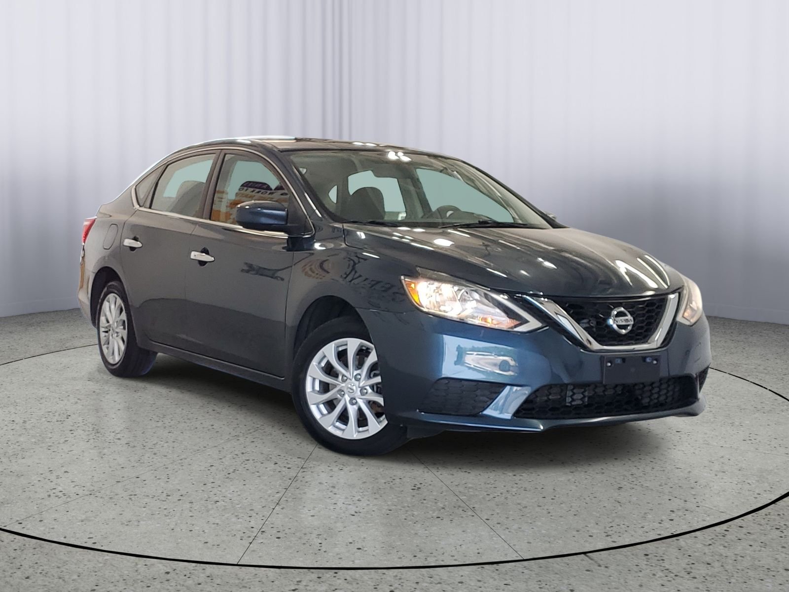 Used 2017 Gray Nissan SV image 1