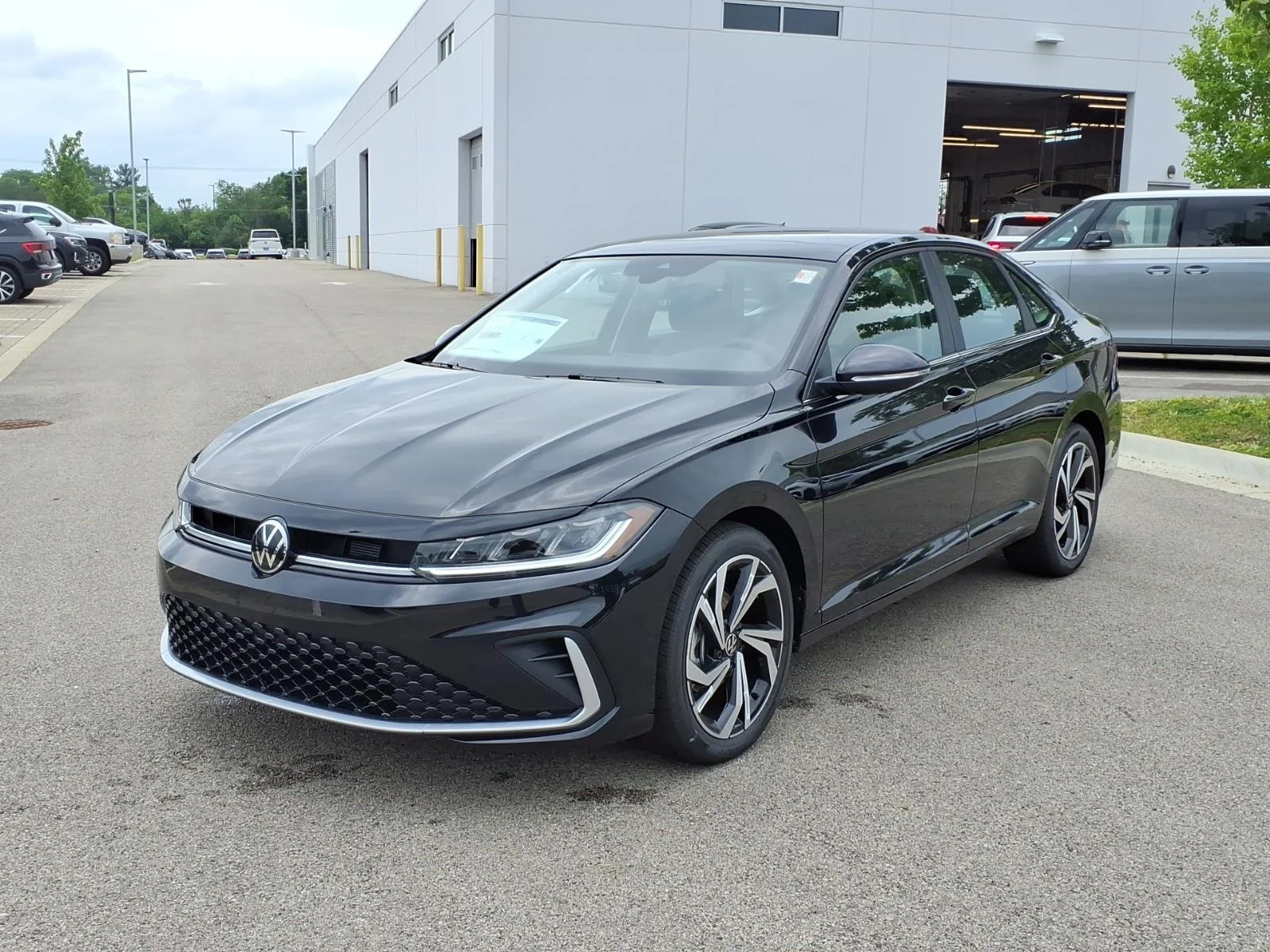 New 2026 Deep Black Pearl Volkswagen SEL AUTO image 3