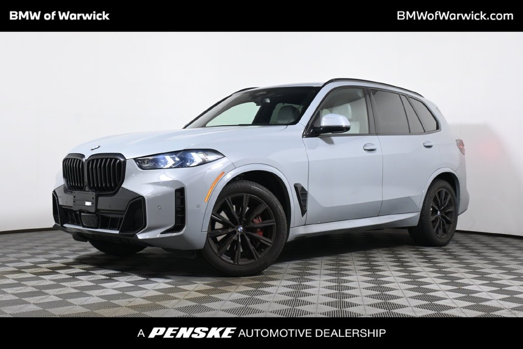 Certified Used 2024 Gray Metallic BMW xDrive40i image 1