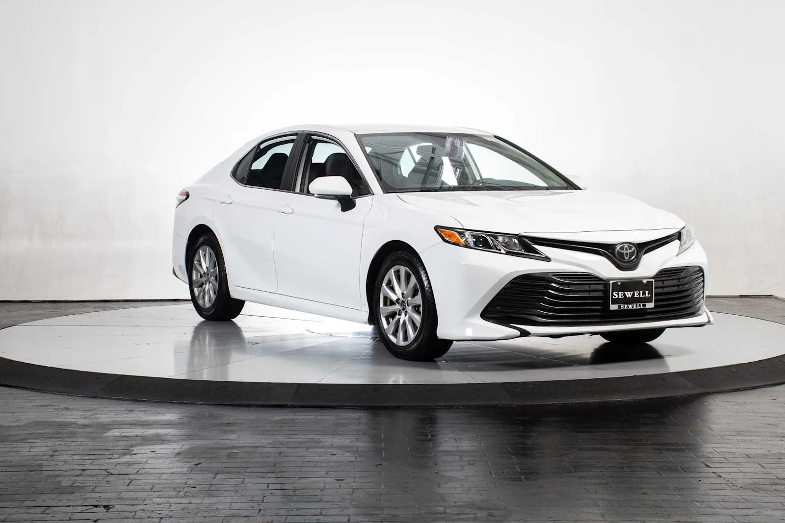 Used 2019 Super White Toyota LE image 8