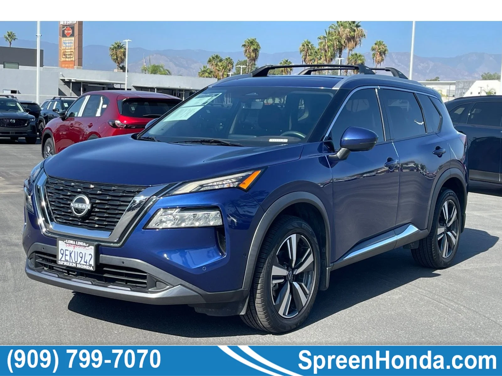 Used 2023 Caspian Blue Metallic Nissan SL image 1