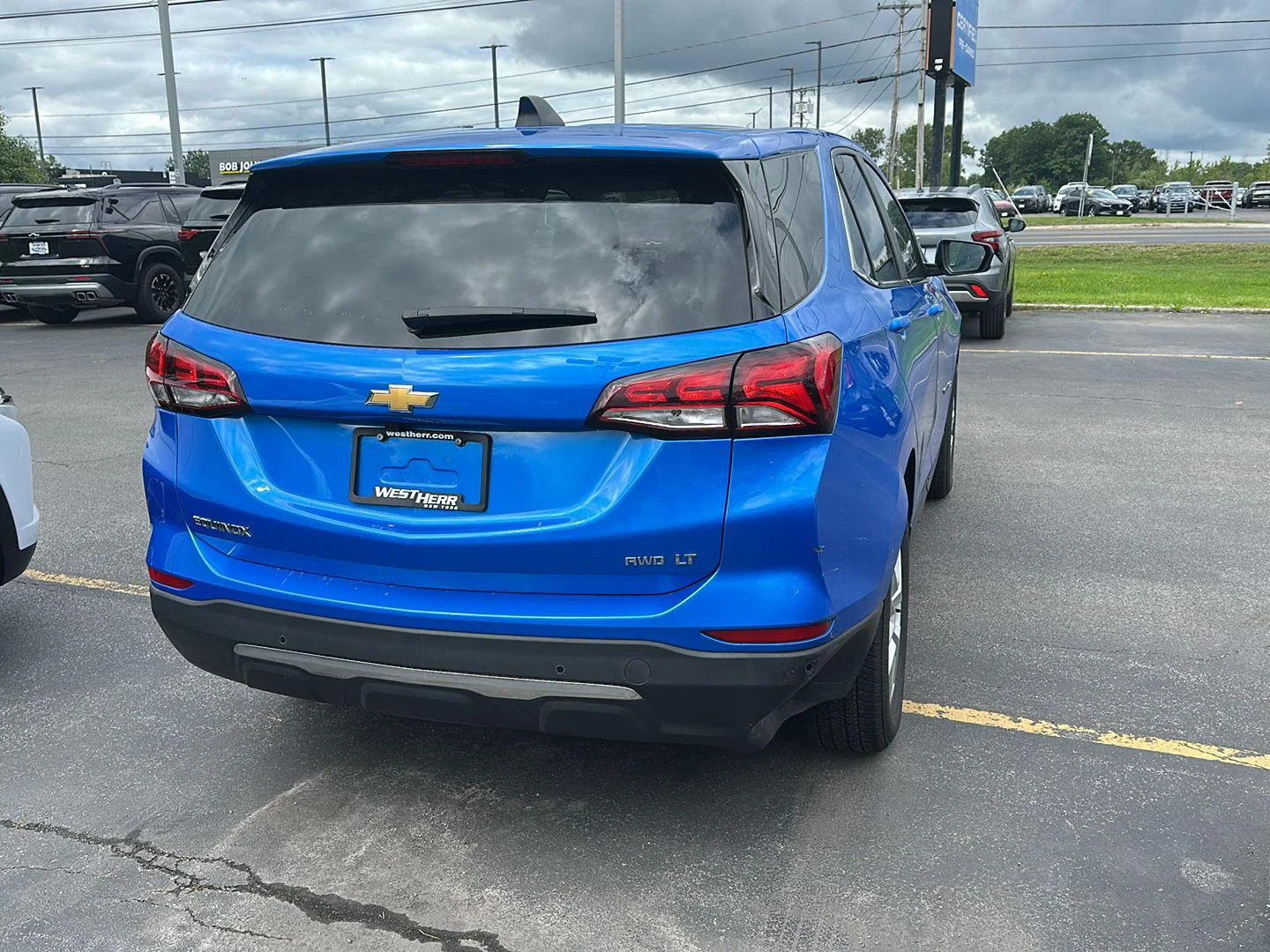 Used 2024 Riptide Blue Metallic Chevrolet LT image 2
