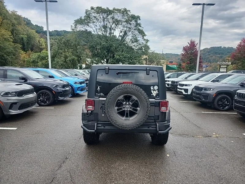 Used 2018 Gray Jeep Unlimited Sport image 6