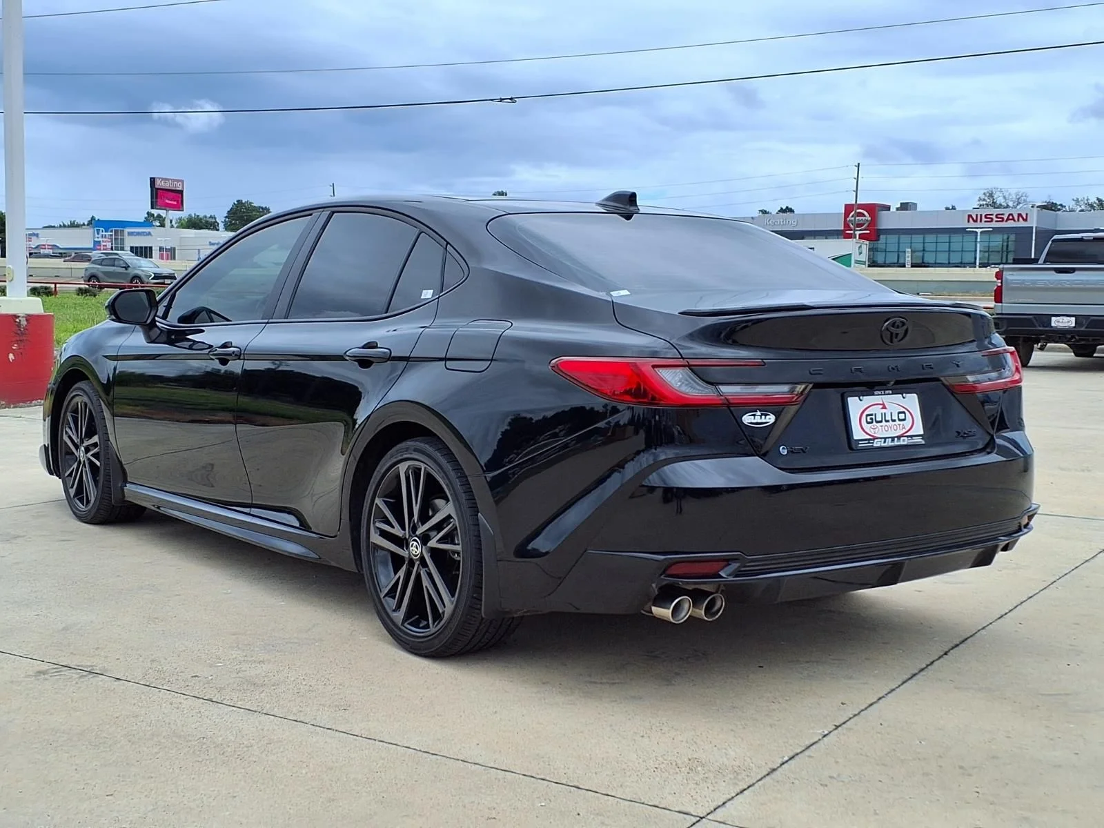 Certified Used 2025 Black Toyota XSE image 2