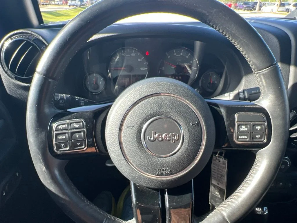 Certified Used 2016 Purple Jeep Unlimited Sahara image 35