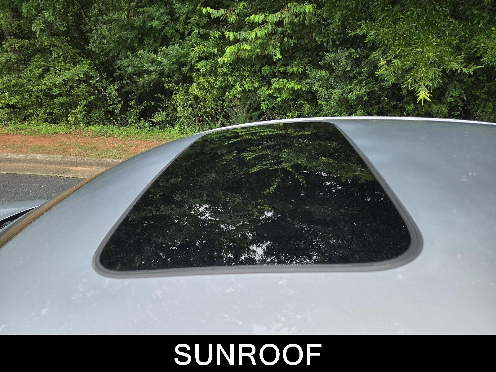 Used 2024 Solar Silver Metallic Honda Sport image 21