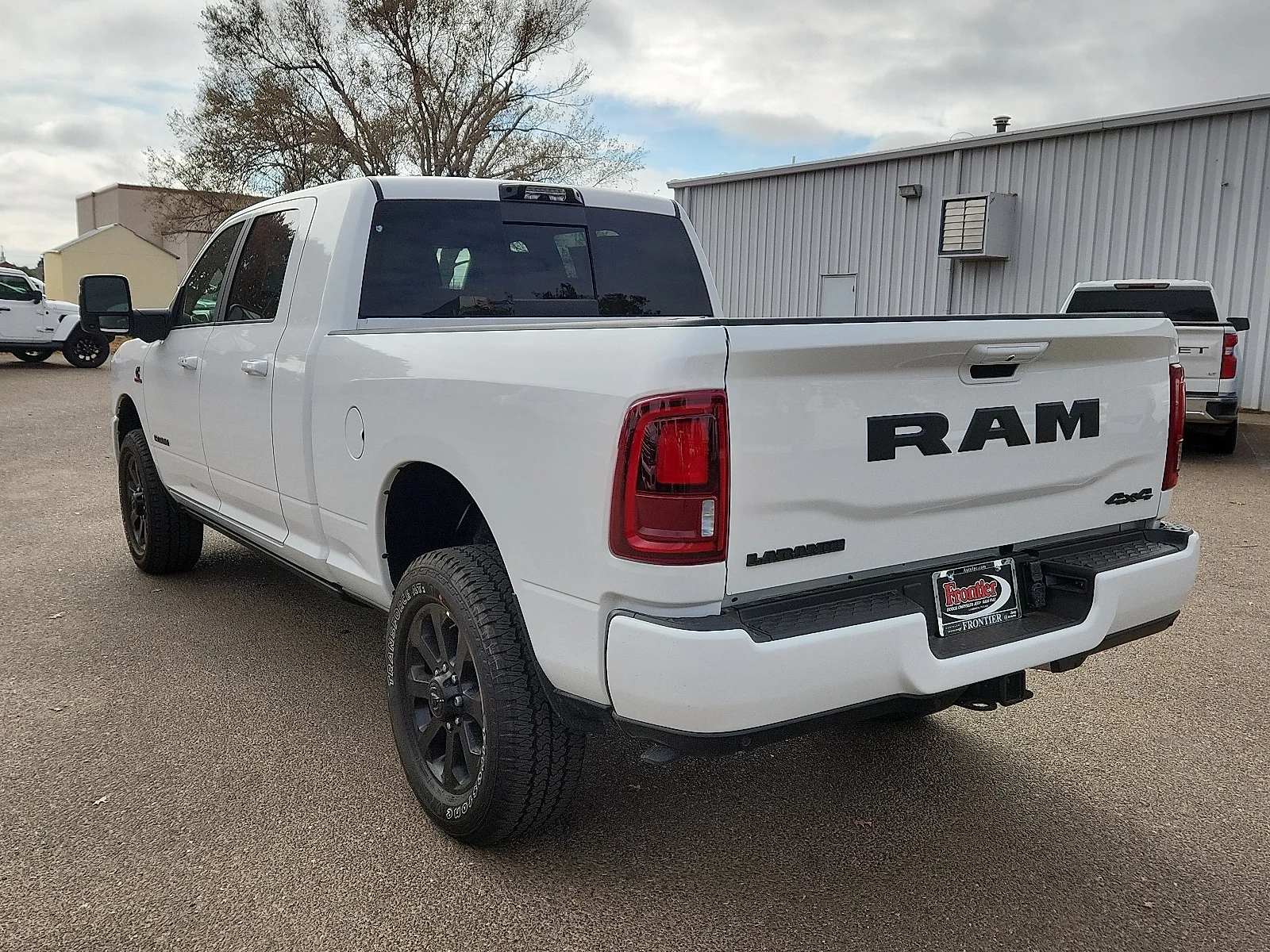 New 2025 Bright White Clear-Coat  Paint Ram LARAMIE CREW CAB 4X4 6