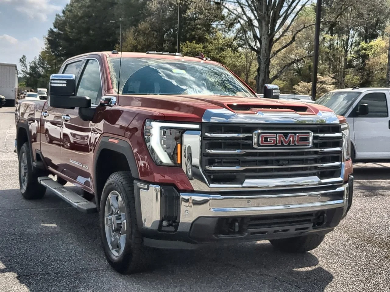 New 2026 Volcanic Red Tintcoat GMC SLT image 2