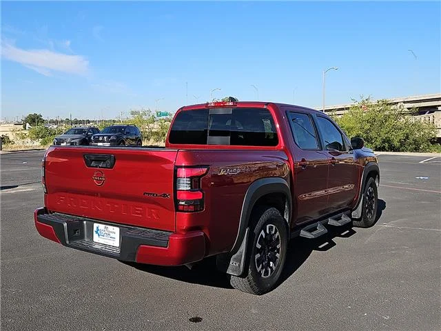 Used 2024 Red Nissan PRO-4X (A9) 4x4 Crew Cab 5 ft. box 126 in. WB image 4