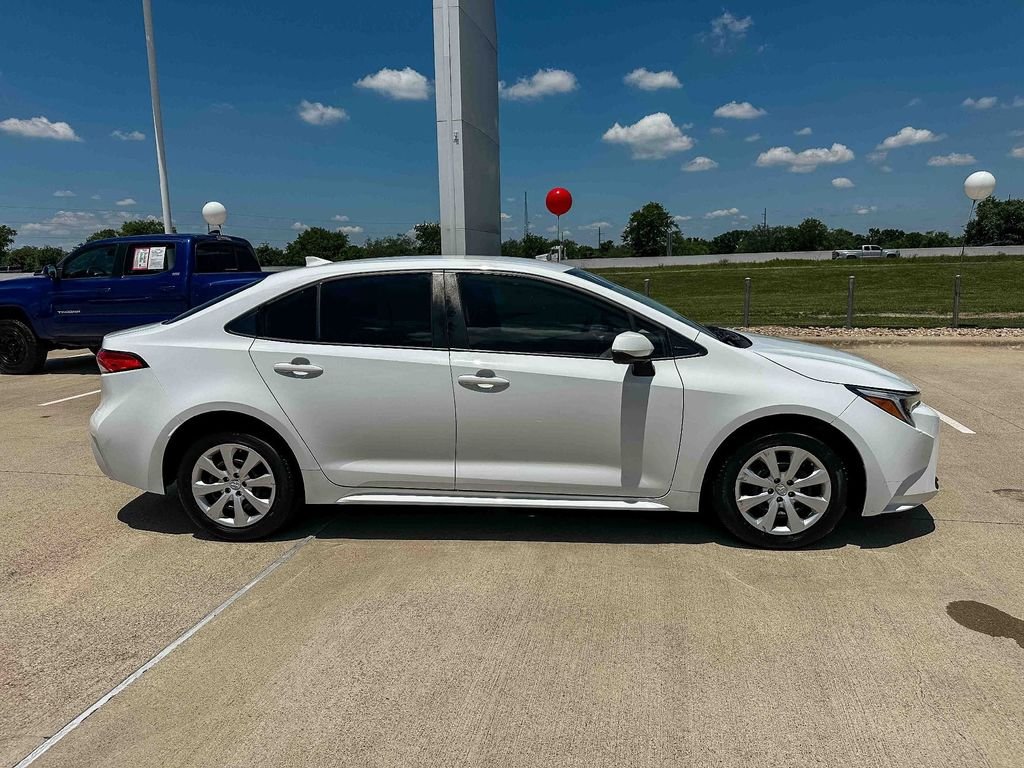 Used 2023 White Toyota LE image 2