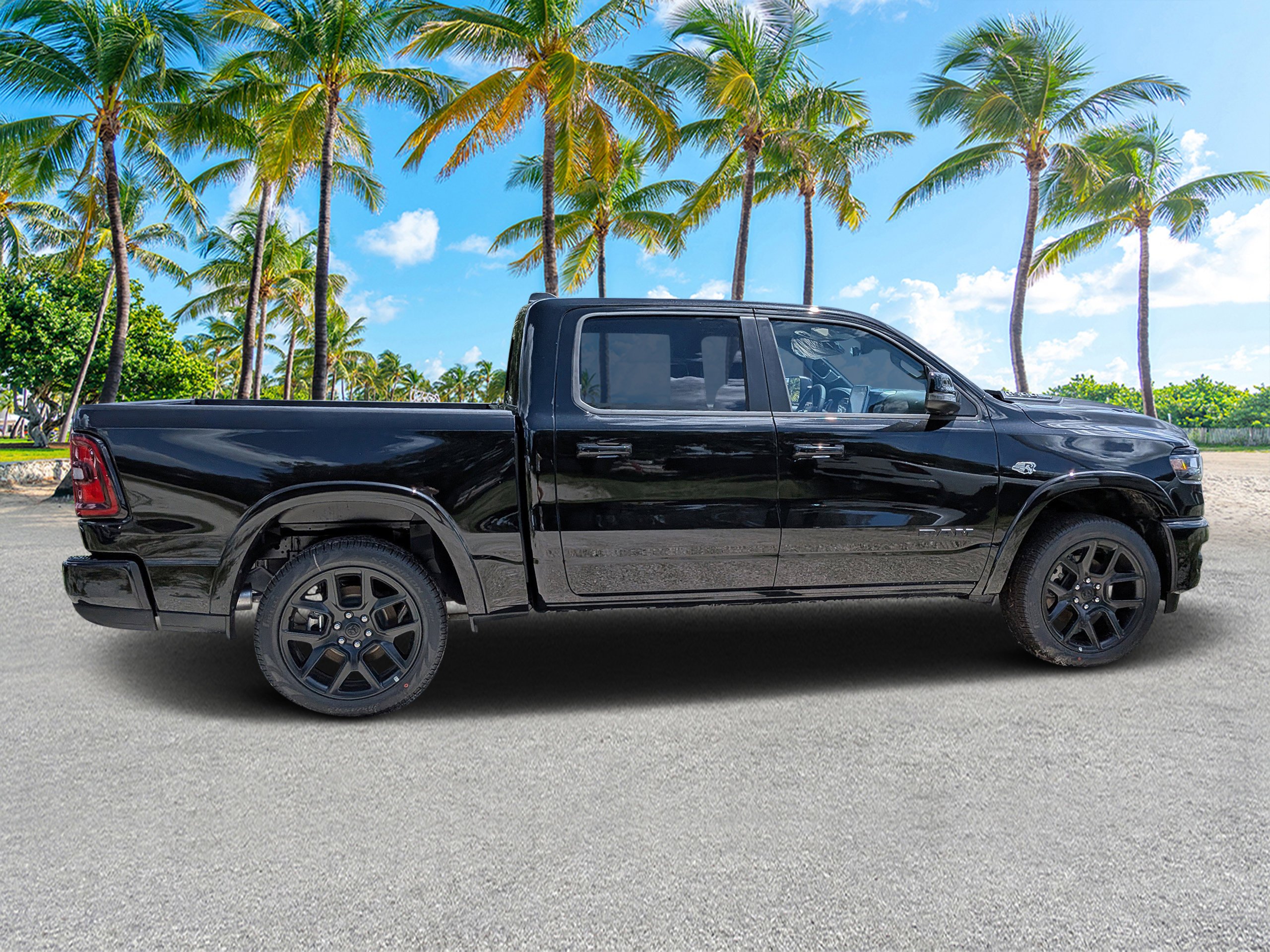 New 2026 Diamond Black Crystal Pearl-Coat Exterior Paint RAM Laramie image 2