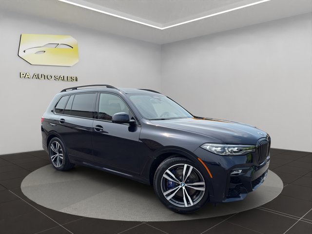 Used 2022 Carbon Black Metallic BMW xDrive40i image 1