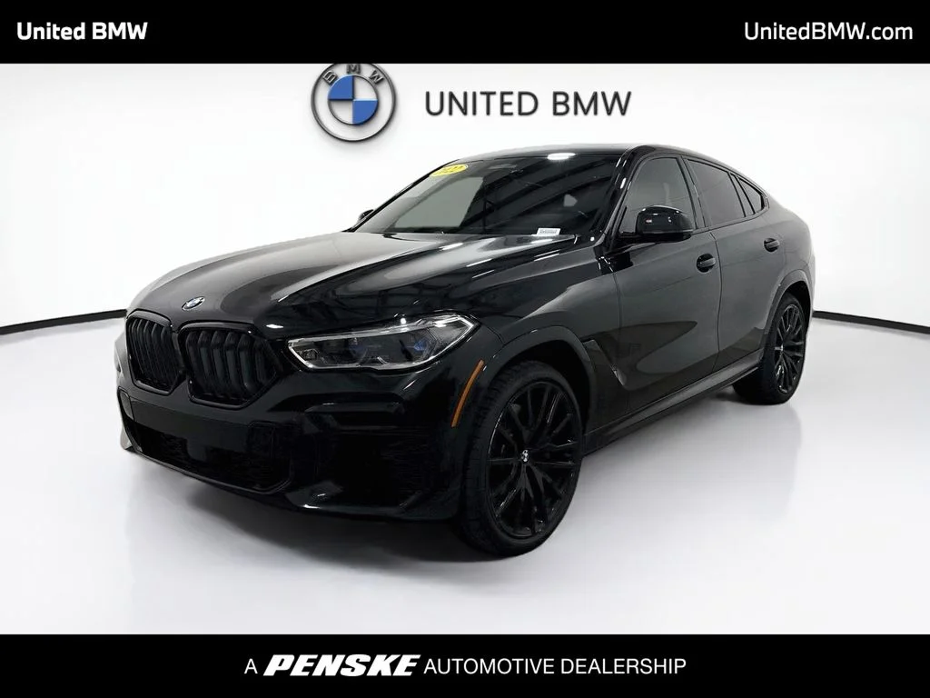 Used 2022 Black Sapphire Metallic BMW M50i image 1