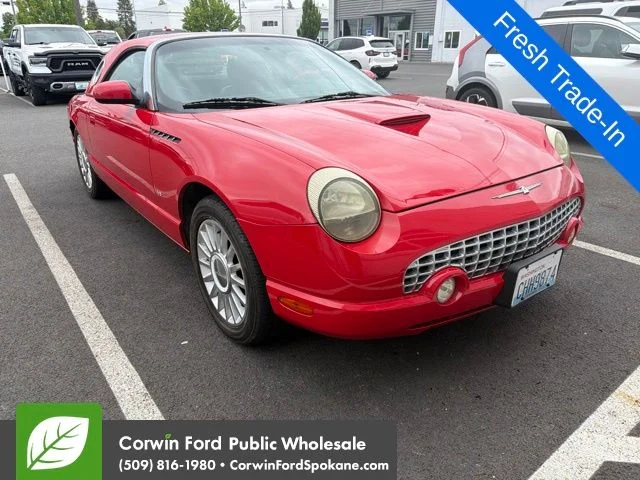 Used 2004 Torch Red Ford Base image 1