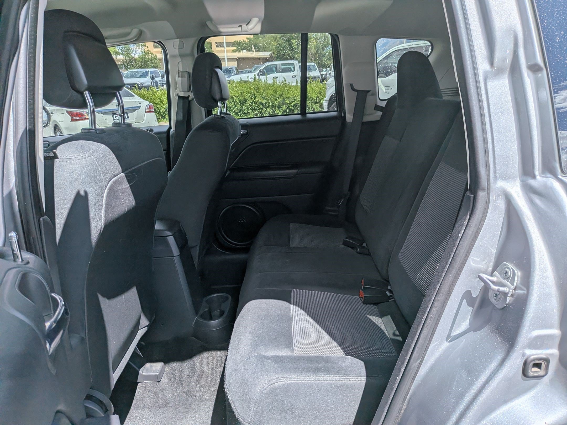 Used 2014 Billet Silver Clearcoat Metallic Jeep Sport image 25