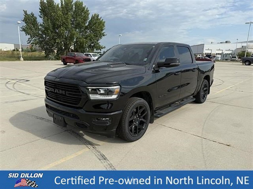 Used 2023 Diamond Black Crystal Pearl Coat Ram Laramie image 1