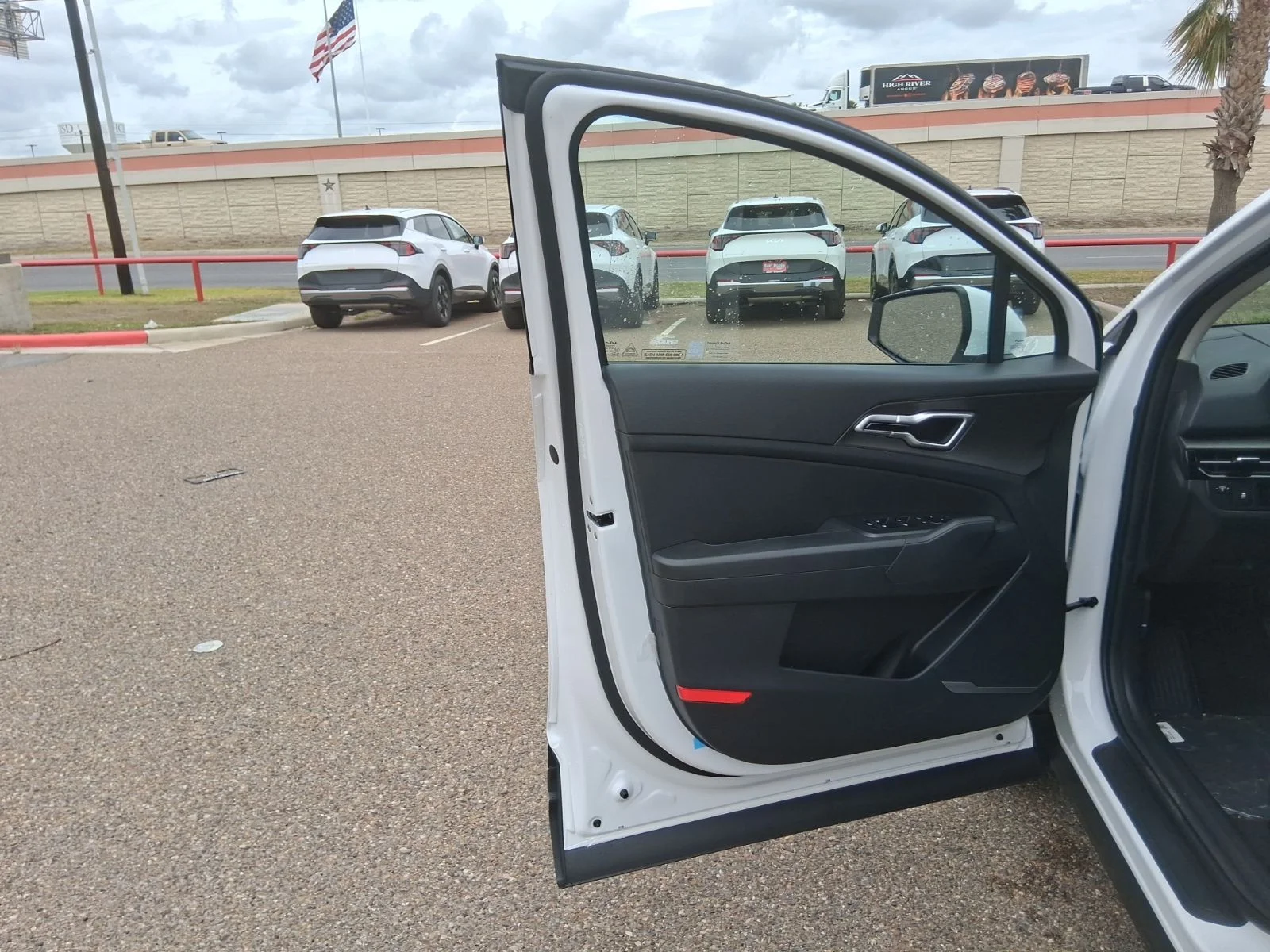 New 2026 Black Kia LX image 14