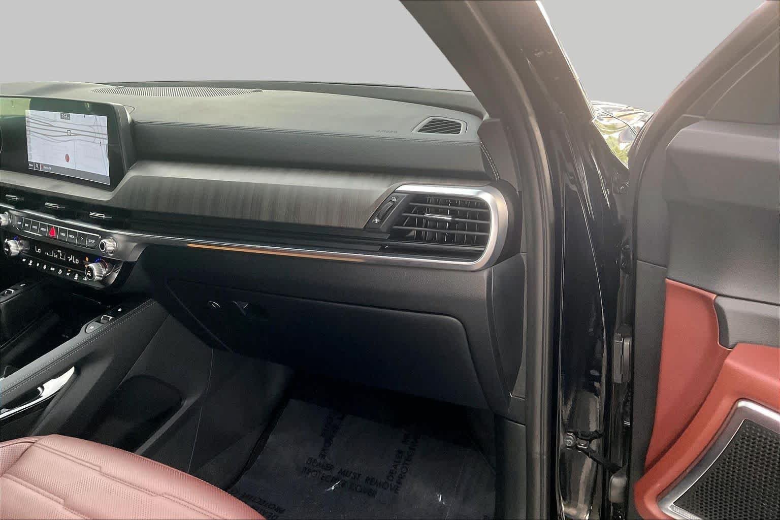 Used 2024 Ebony Black Kia SX Prestige image 19