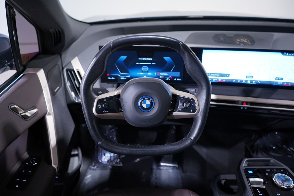 Certified Used 2024 Blue BMW xDrive50 image 9