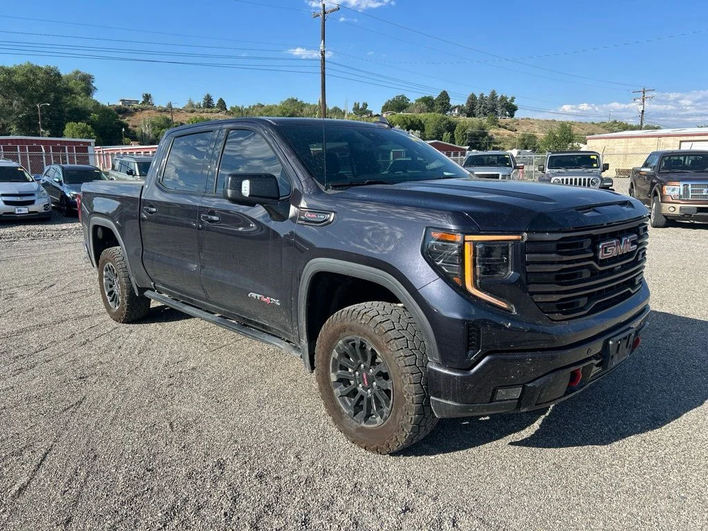 Used 2022 Titanium GMC AT4X image 1
