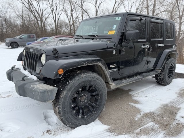 Used 2009 Jeep Wrangler Unlimited Sahara with VIN 1J4GA59199L731312 for sale in Augusta, KS