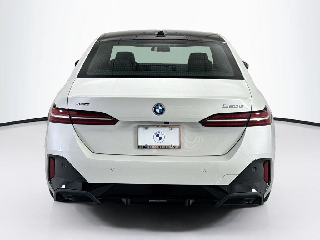 New 2027 White Metallic BMW 550e xDrive image 6