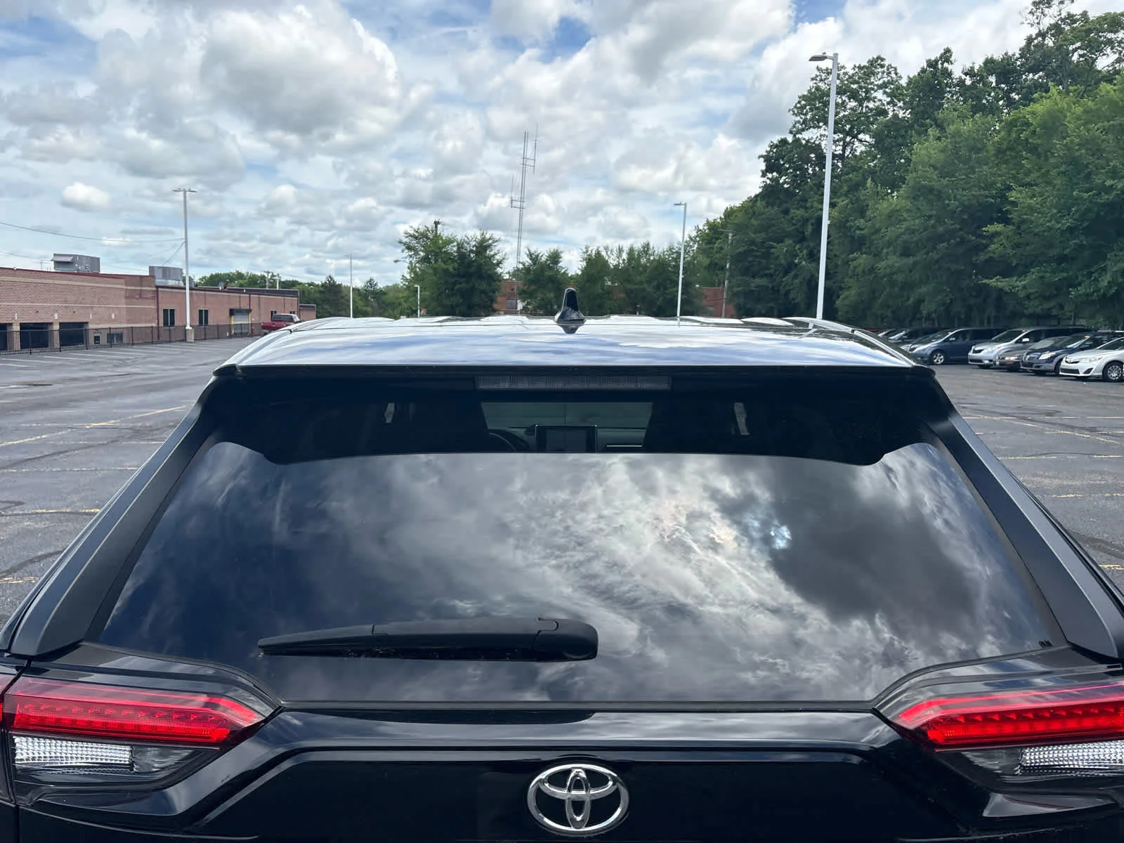 Used 2024 Midnight Black Metallic Toyota LE image 6