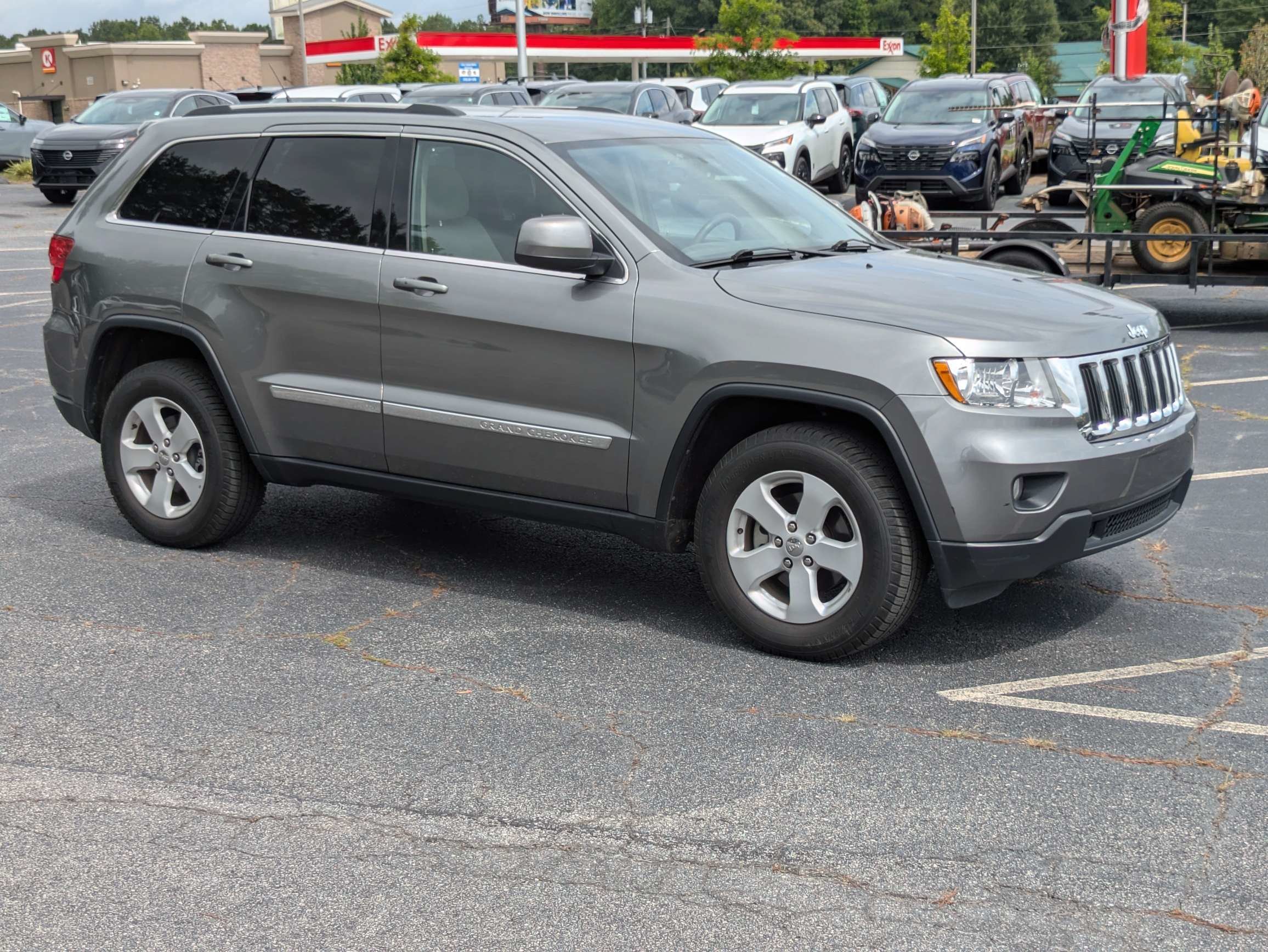 Used 2013 Gray Jeep Laredo image 1