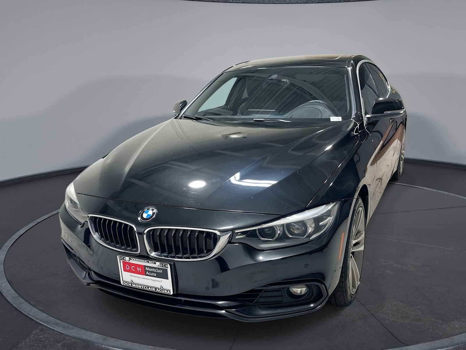 Used 2018 Black BMW 430i xDrive image 1