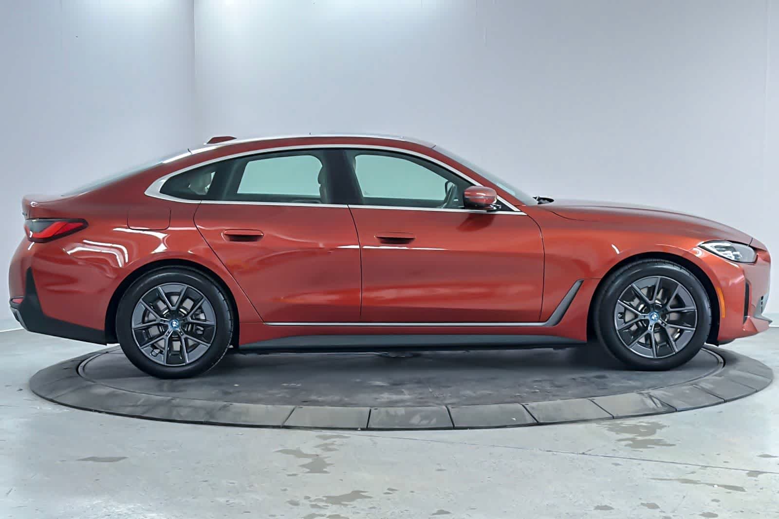 Used 2024 Sunset Orange Metallic BMW eDrive40 image 8