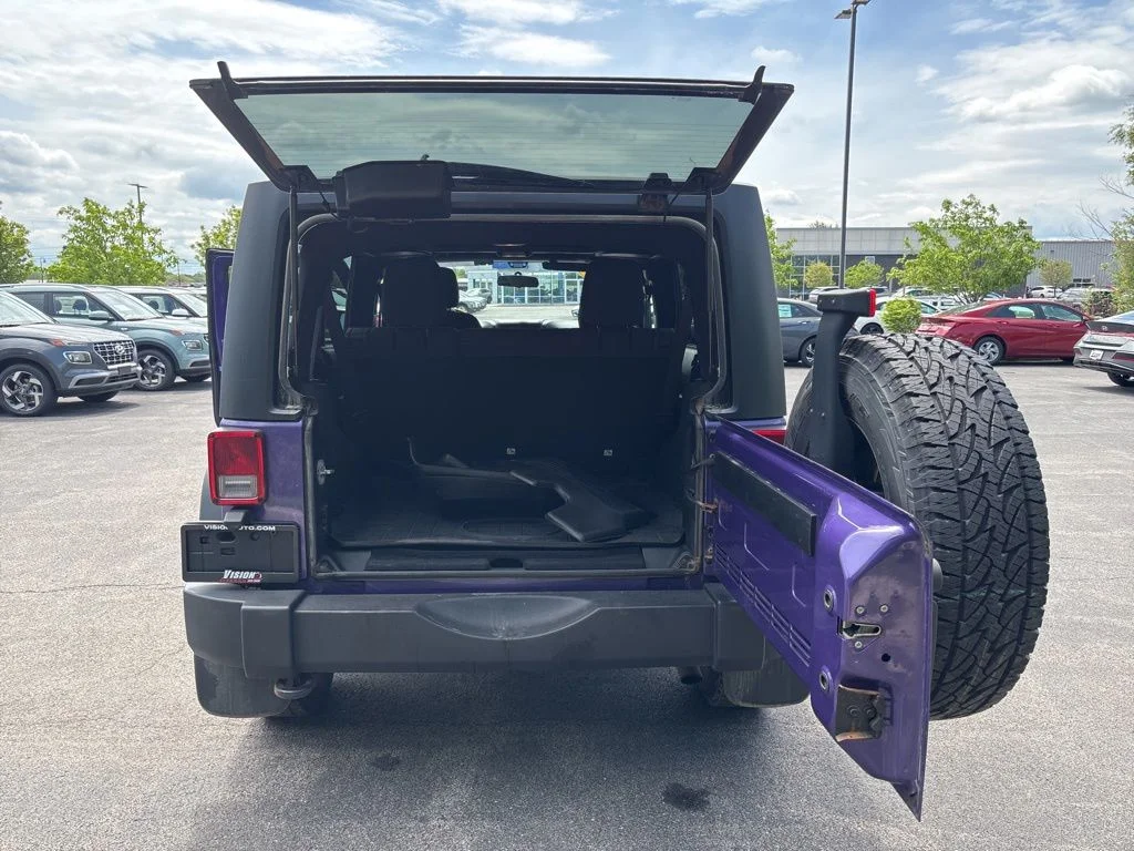 Used 2017 Purple Jeep Unlimited Sport image 8