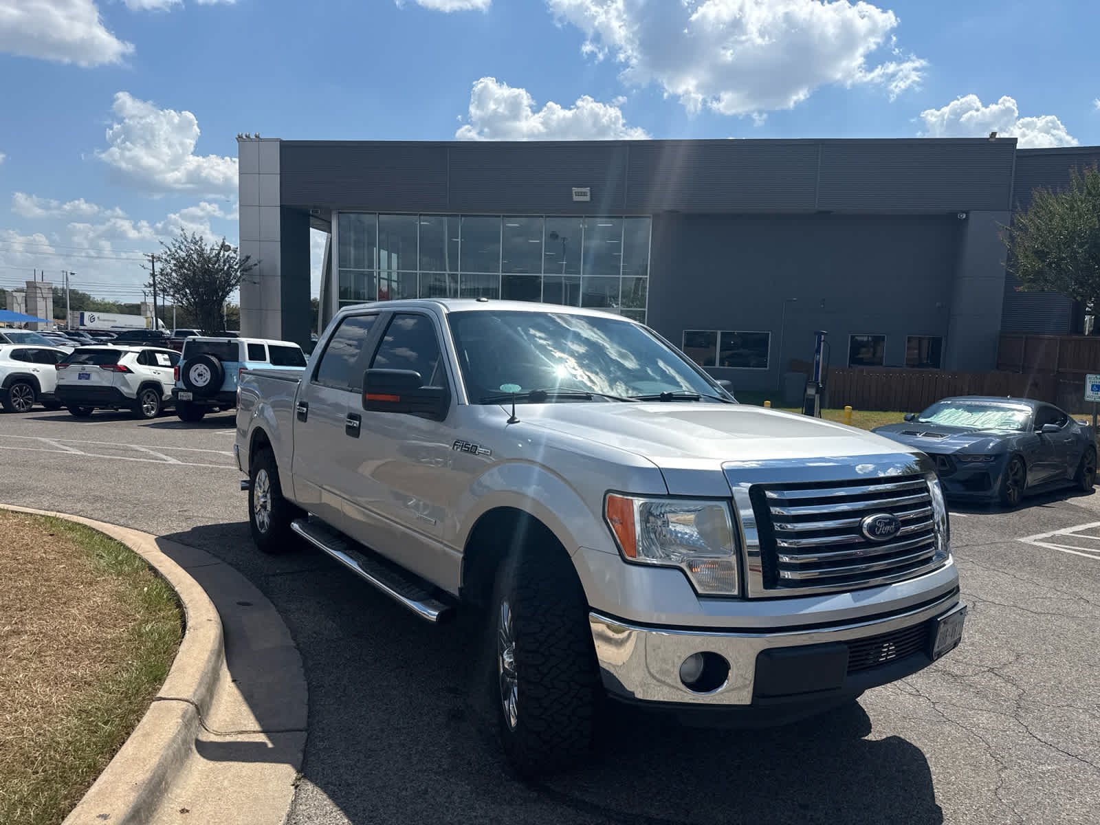 Used 2011 Ingot Silver Metallic Ford XLT image 2