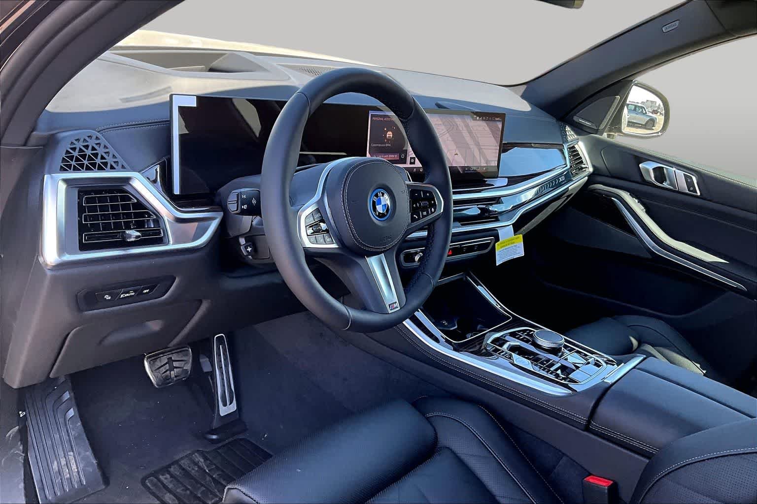 New 2026 Carbon Black Metallic BMW xDrive50e image 8