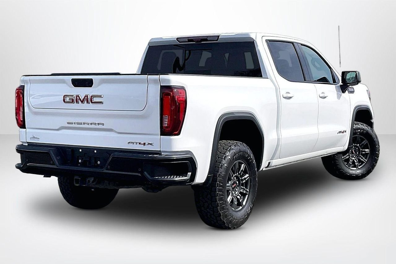 Used 2024 Summit White GMC 4WD Crew Cab Short Box AT4X image 6
