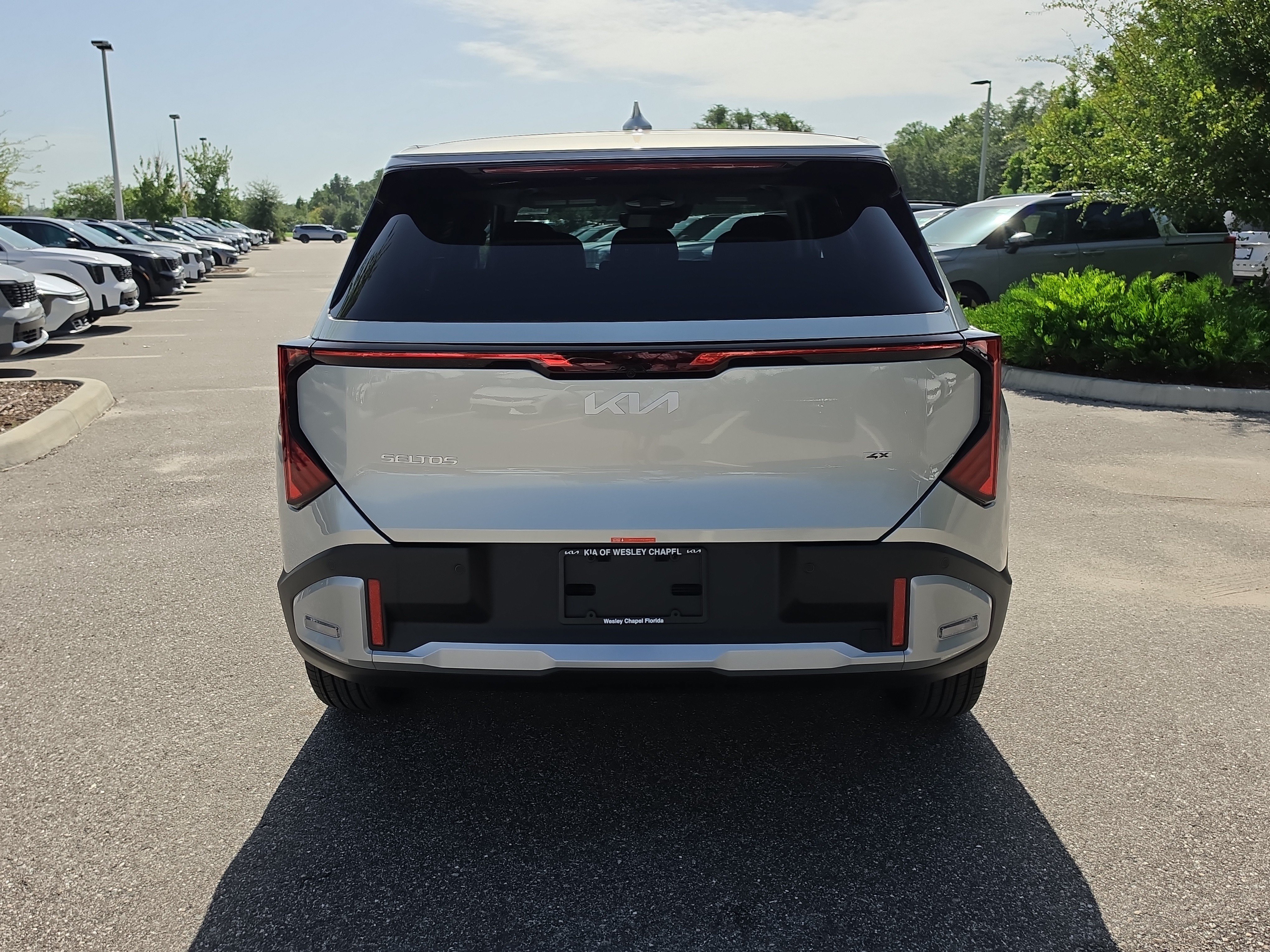 New 2027 Ivory Silver Kia LX image 7