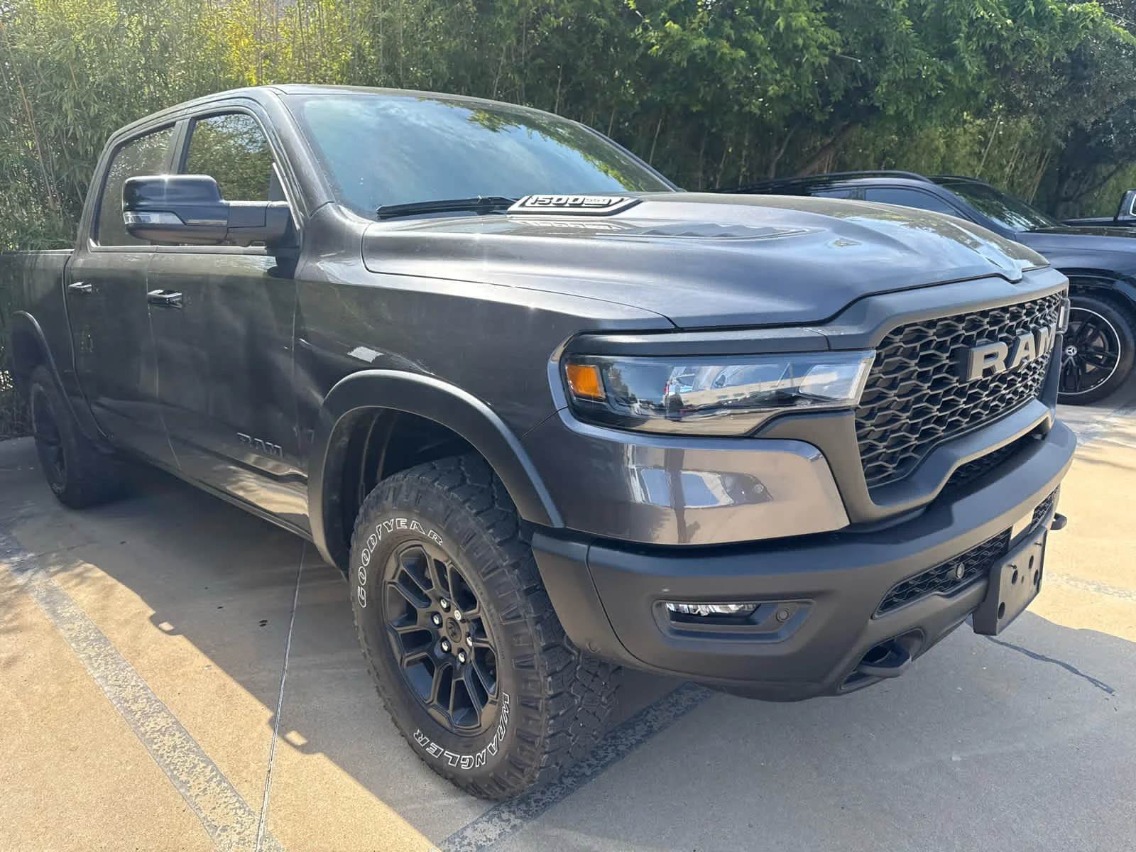 Used 2025 Granite Crystal Metallic Clearcoat Ram Rebel image 2