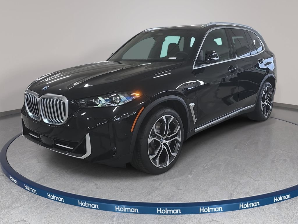 New 2026 Black Sapphire Metallic BMW xDrive50e image 1