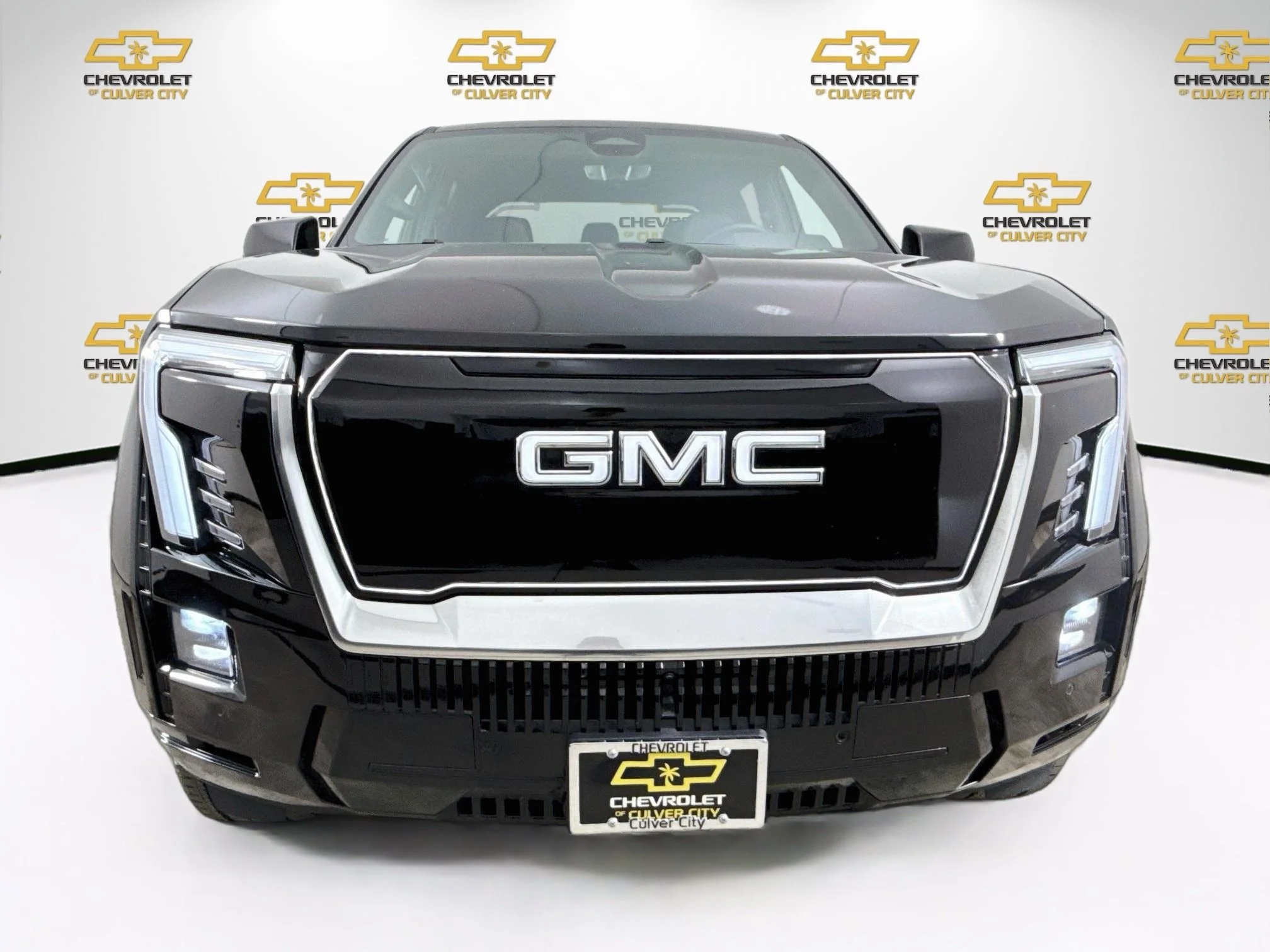 Used 2025 Onyx Black GMC Max Range Denali image 2