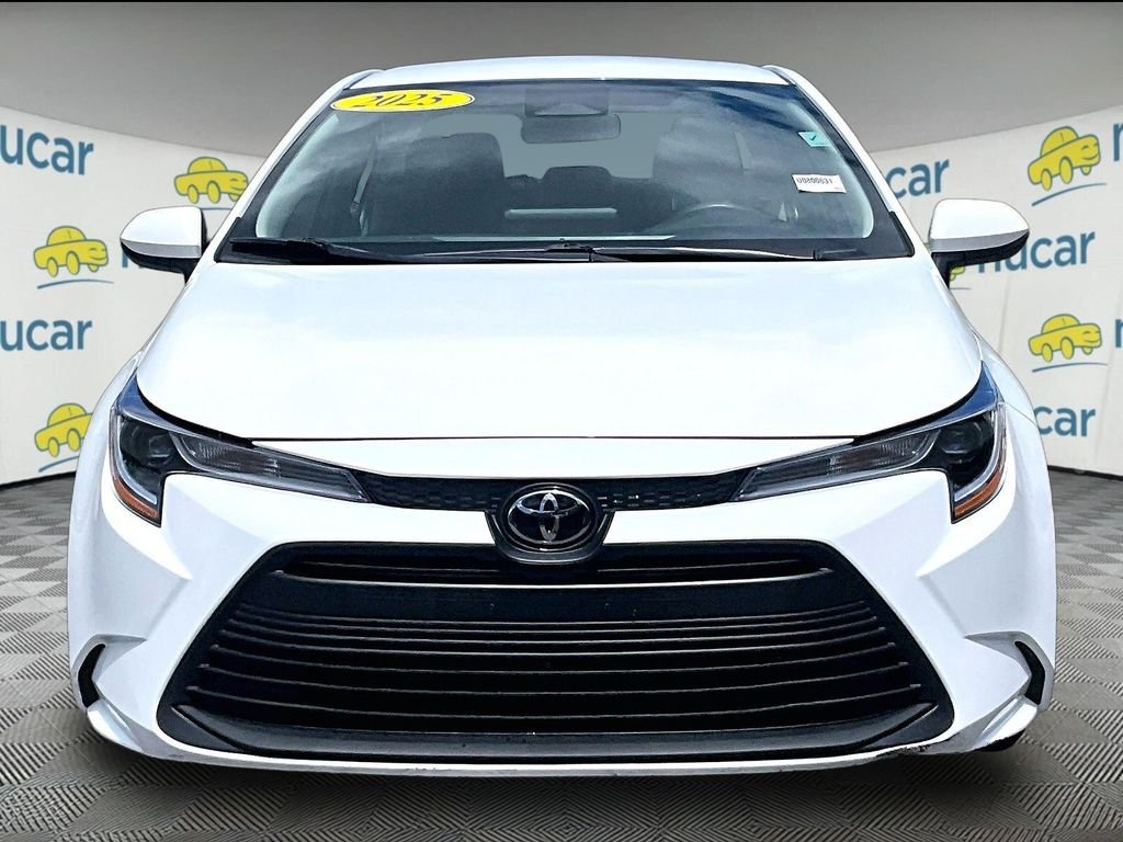 Used 2025 White Toyota LE image 2