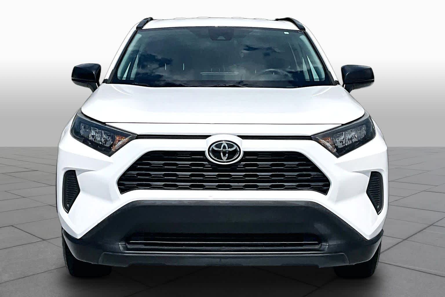 Used 2021 Super White Toyota LE image 4