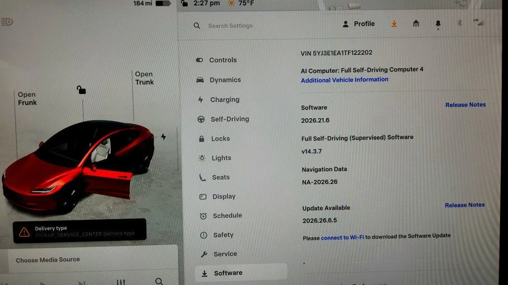 Used 2026 Ultra Red Tesla Long Range RWD w/ White & Black Premium Interior image 16