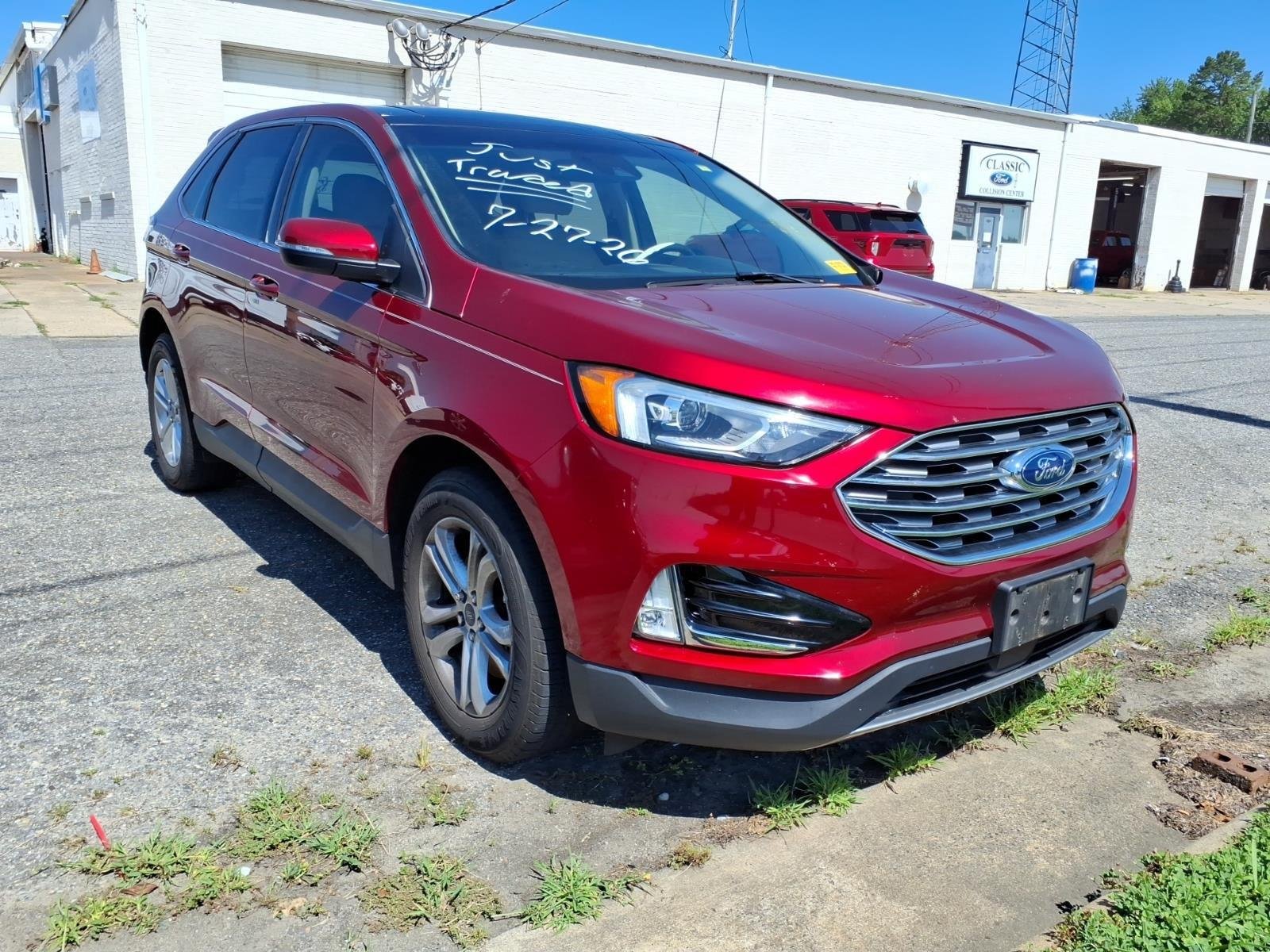 Used 2019 Ruby Red Metallic Tinted Clearcoat Ford SEL image 4