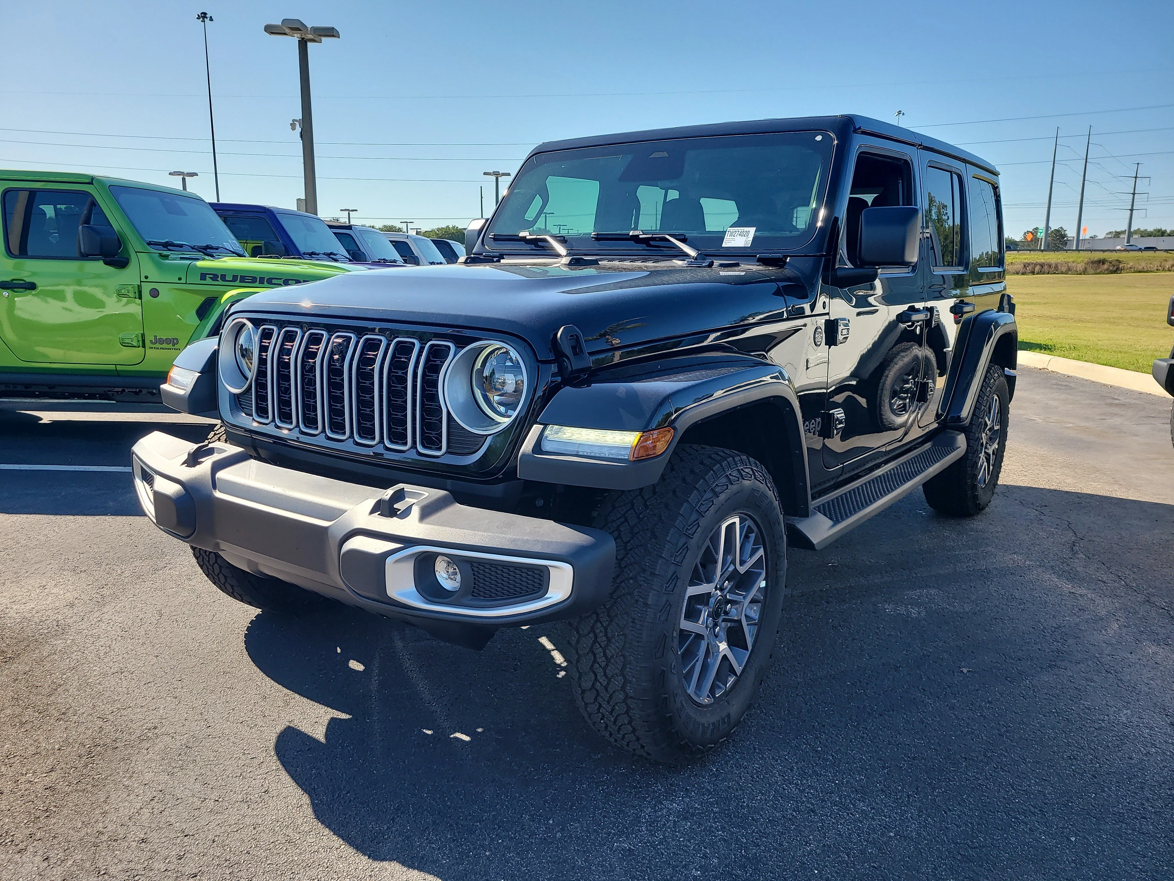 New 2026 Black Clearcoat Jeep Sahara image 3