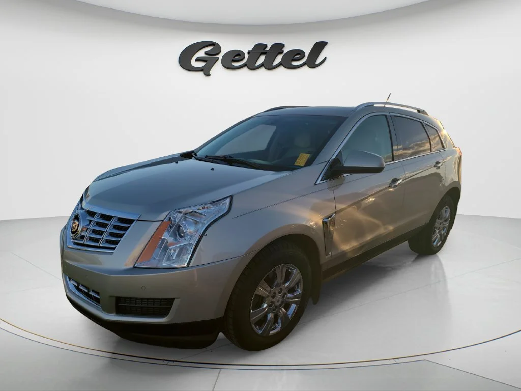 Used 2014 SILVER COAST METALLIC Cadillac Luxury Collection image 1