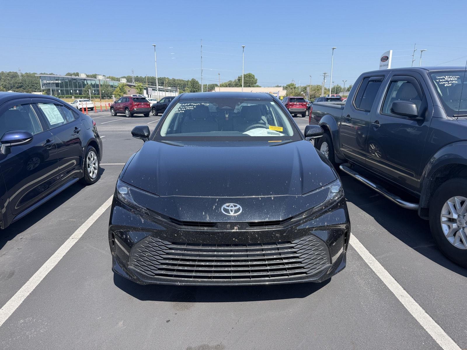 Used 2025 Midnight Black Metallic Toyota LE image 2