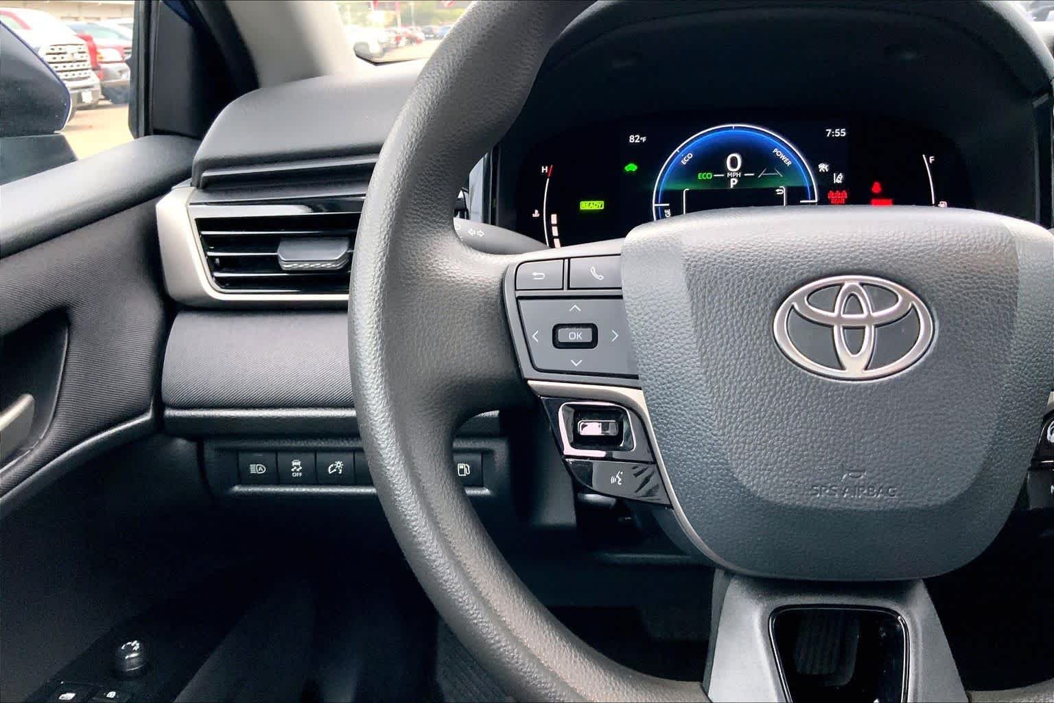 Used 2025 Reservoir Blue Toyota LE image 23